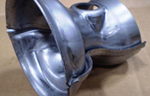 Upper and Lower Cones From 2-Out Progressive Die